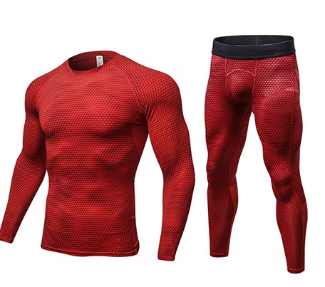The Compression Cool Dry Sports Tights set features a red, long-sleeve compression shirt and matching athletic leggings with a textured pattern in quick-dry fabric, displayed against a white background.